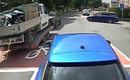 Pickup truck driver runs red light and slams into family car
