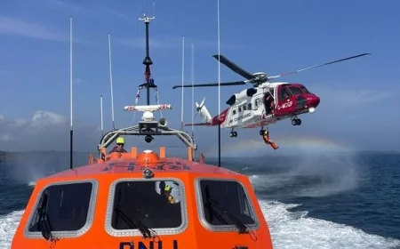 Coastguards in Wales could be forced to stop lifesaving work if pay cuts go ahead